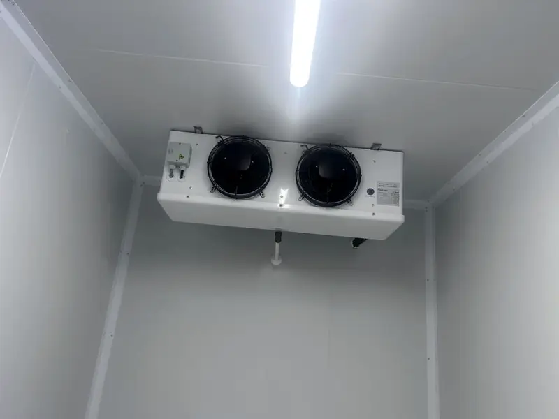 Twin-fan evaporator installed in a new white cold room